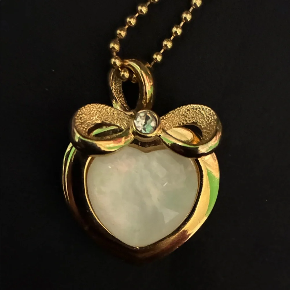 Pair of Gold Tone Pendant Necklaces with hidden (untested) watches - Picture 5 of 8